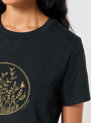 Tshirt femme manche courte de couleur noir et en coton biologique avec dessin de fleurs en sérigraphie doré.