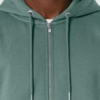 Veste sweat pour homme et femme en coton biologique de couleur vert jade avec un dessin de montagne dans le dos et une inscription noté silence de sérigraphie beige.
