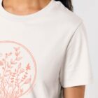Tshirt manche courte femme de couleur beige avec le dessin de fleurs en couleur pêche.